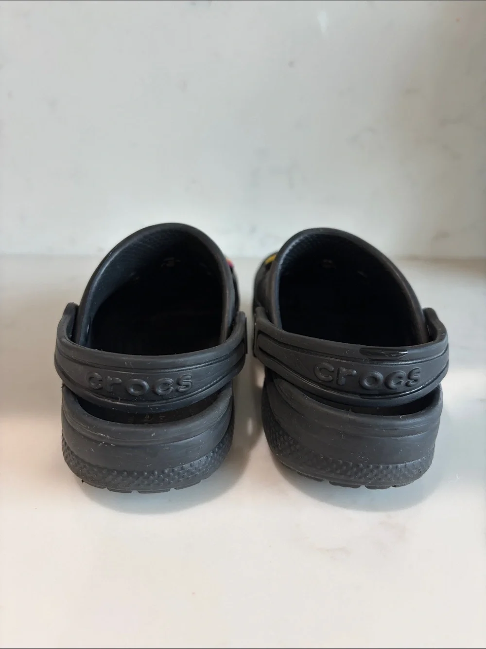 CROCS Kids Black Clogs with Colorful Charm Pins